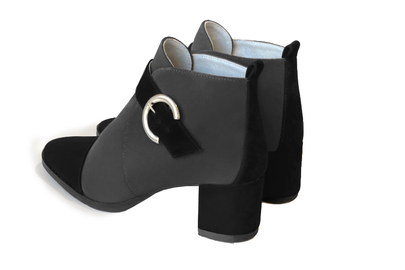 Matt black and dark grey women's ankle boots with buckles at the front. Round toe. Medium block heels. Rear view - Florence KOOIJMAN